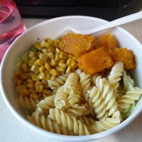 Cheesy pasta with sesame sauce, pumpkin and corn option. at The Crowded Bowl - Changi General Hospital in East Singapore