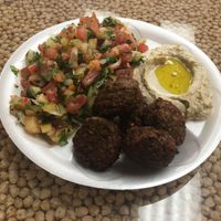 Falafel plate with hummus and Israeli salad  at Sunrise Pita and Grill in Davie