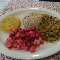 Yuca patty, beet salad, rice, lentil mixture at Prana Veggie in Quito