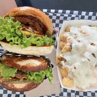 charbroiled Needy Meaty with thrilling foods bacon, charbroiled Ghostown Burger, and loaded tater tots  at Malibu's Burgers in Oakland