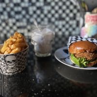 Malibu’s Burgers Enjoyed at Home   at Malibu's Burgers in Oakland