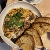 Sundried Tomato and Arugula Omelette with sweet potato and bread  at Lulu Green in Boston