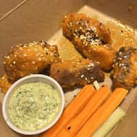 Maple hot sauce, glazed boneless wings  at Lulu Green in Boston