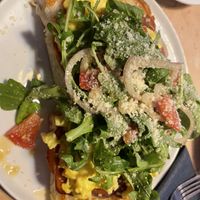 Prosciutto scramble on focaccia   at Lulu Green in Boston