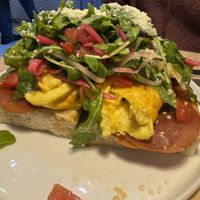 Prosciutto scramble toast on focaccia   at Lulu Green in Boston