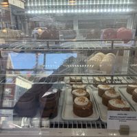 Pastry case with macarons et al  at Lulu Green in Boston