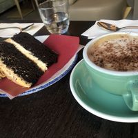 Salted caramel fudge cake and oat cappuccino   at Wulf & Lamb Marylebone in London
