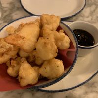Fried cauliflower with delicious sticky sauce.  at Wulf & Lamb Marylebone in London