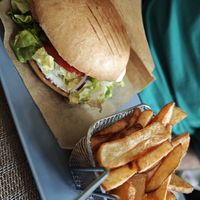 Chix burger with fries at Vegan Loving Hut Neubau in Vienna
