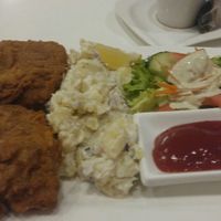 Wiener Schnitzel with potato salad at Vegan Loving Hut Neubau in Vienna