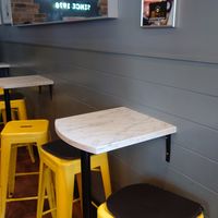 Some tables inside at The Rolling Donut - O'Connell St Kiosk in Dublin