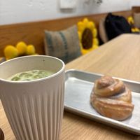 Matcha cold latte and bun at Brewing Good Coffee Company in Savage
