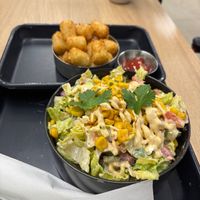 Seasonal street corn salad and side of tots at Brewing Good Coffee Company in Savage
