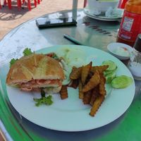 Half of the tofu burger (we forgot to take a photo earlier, so of course you get a full burger) at Khmer Food Café - Food Stall in Kampot