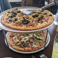 Top pizza is vegan and it was so creamy and rich! at The Star on Park in Alameda