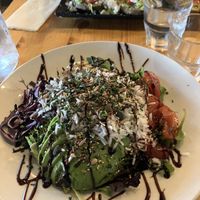 Buddha bowl in foreground. Feta bread in background.  at The Architect in Le Havre