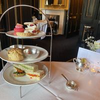 High tea: sandwiches, potato, scone, desserts  at The Georgian Tearoom The Dome in Edinburgh