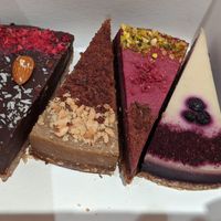 Take away box with 4 raw vegan cakes at Patisserie Valerie in Edinburgh