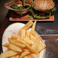 Fries and burger with a side salad at Peter Pane - Pasing in Munich