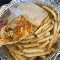 Buffalo chikn wrap with fries   at My Deli Gourmet in Bronx