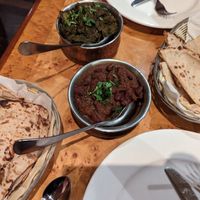 Aloo saag, kidney bean curry and parathas at Marinades Indian Cuisine in Cairns