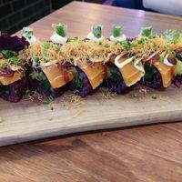 Flambé Salmon Roll (17.95€, 8 pieces in the front row); nice taste, especially liked the kataifi on top at Vegan Sushi Bar - Kinkerstraat in Amsterdam