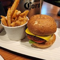 Vegan Impossible Garden Goddness burger in a traditional bun, served with regular chips.  at Grill'd in Surfers Paradise