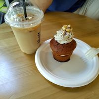 Carrot muffin and ice coffee with oat milk at Chök in 
