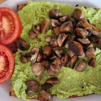 Vegan smash with mushrooms and oven roasted tomatoes. Really good! at Belly Café in Mullingar