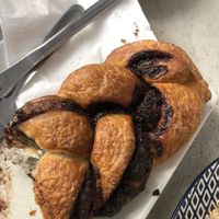 Pain au chocolate (half eaten already)  at Panonia Coffee in Granada