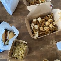 Fried mushrooms, poutine, Mac and cheese and tofu Nashville.  at Maynard in Montreal