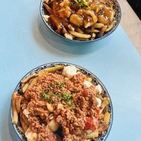 Regular and Italian poutine  at Maynard in Montreal