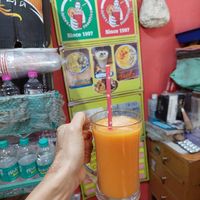 Orange Papaya Juice (100 INR) at Pap's Juices & Smoothies in Udaipur