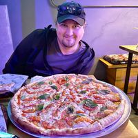 Gigante size for scale- biggest pizza on the planet??  at Curly & Pizza in Quito