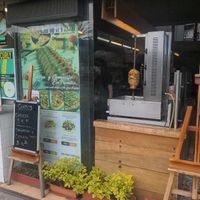 They literally sell dead-chickens-on-a-stick. This is *not* a vegetarian restaurant. at Curly & Pizza in Quito