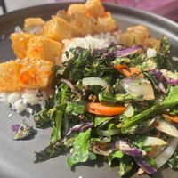 Crispy spicy tofu, rice, & fresh green & veggie medley.  at The Plot in Oceanside