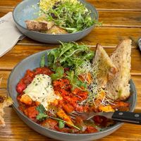 Vegan Shakshuka and Vegan Scramble (closeup) at FACTORY GIRL Restaurant. in Amsterdam