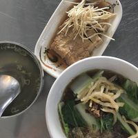 Dry starch noodle bowl with veggie meat and greens; yuba skin garnished with ginger; complimentary broth.  at Guān Xiǎng SùShí Xiāng 觀響素食鄉 in Tainan