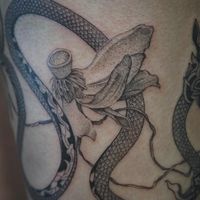 𝙄𝙂: 𝙣𝙖𝙩𝙚_𝙩𝙝𝙖𝙞𝙡𝙖𝙣𝙙 🍃 Thai Naga tattoo with dying lotus flowers by a Thai tattoo artist in Chiang Mai, Thailand at Baan Khagee Tattoo in Chiang Mai