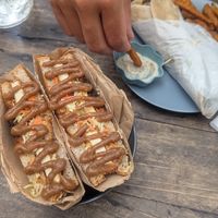 Tofu katsu sando in front, falafel wrap in the background at Fresh Bites in Coron