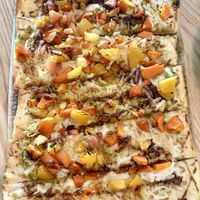 Flatbread w/hummus and vegan cheesee  at Spritz City Bistro in Stuart