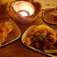 Roti, mushrooms, and delicious pumpkin stew. at The Coconut Tree in Bournemouth