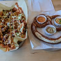 Loaded nachos + giant pretzel w/ beer cheeze dip at Dead Bird Brewing in Milwaukee
