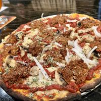 SHMO (house made mozzarella, red sauce and Italian sausage) with mushroom and onions  at Dead Bird Brewing in Milwaukee