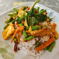 sorry, forgot the exact name. I believe it was the stir fried veggies in roasted curry paste on rice. at Vegetarian Eatery อารหารเจ ร้านสำหรับเจ in Ayutthaya