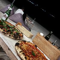 Vegan pizza on the left !!   at Mama Pizza in 