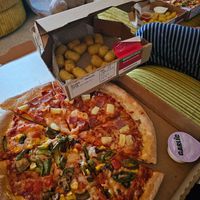 Vegan Hawaiian and Garden Party Pizza with potato tots. at Papa John's in Bury St Edmunds