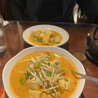 Choo chee curry (top) and Tom yum noodle soup at Singha Thai Cuisine in Moab
