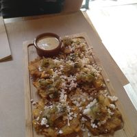 Tostones veganos (Rodajas de plátano verde) at Tumatey in Barcelona