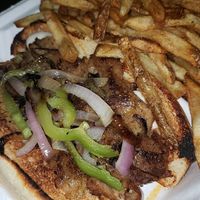 seitan Philly cheesesteak and fries at Mid City Grill in Johnson City